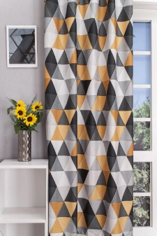 Vesta-Okkersárga színű nyomott háromszögmintás dimout egyedi méretre varrva