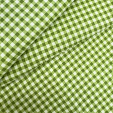Zöld színű kiskockás vízlepergető vászon dekor és egyedi méretű asztalterítő egyedi méretre varrva