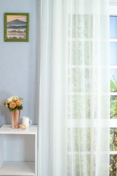 Ecrü színű csillogós fényáteresztő függöny egyedi méretre varrva